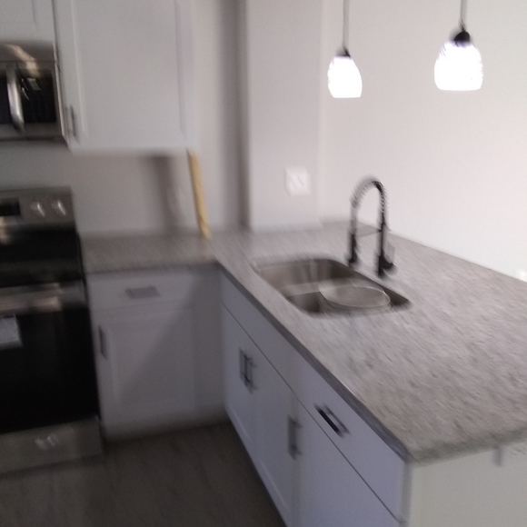Fabrication and installation of Granite and Quartz - Picture 1 of 2